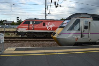 Virgin Trains East Coast 91126 and 43319 at Peterborough on July 26. RICHARD CLINNICK.