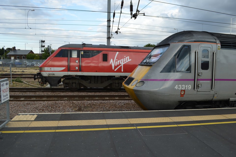 Virgin Trains East Coast 91126 and 43319 at Peterborough on July 26. RICHARD CLINNICK.